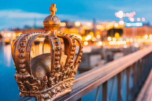 Stockholm, Sweden. Skeppsholmsbron - Skeppsholm Bridge With Its Famous Golden Crown In Night Lights - Stock Photo - Images