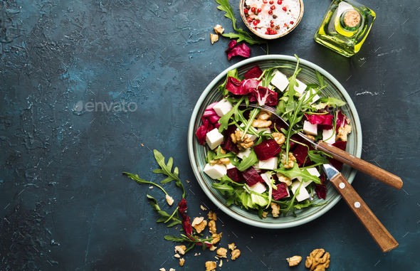 Beet or beetroot salad with fresh arugula - Stock Photo - Images