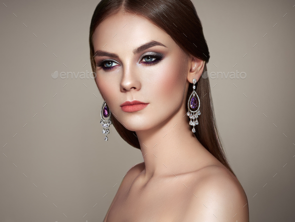 Brunette woman with long shiny smooth hair - Stock Photo - Images