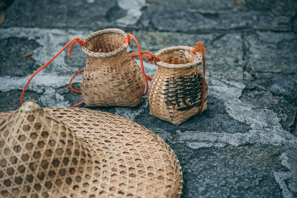 Freshly collected green tea leaves in wicker bowls - Stock Photo - Images