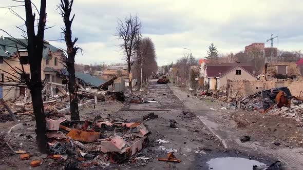Bucha After The Bombing. Bombed City In Ukraine. Blown Up Tanks