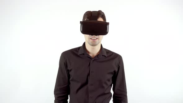 Man Playing in Virtual Reality Goggles alt