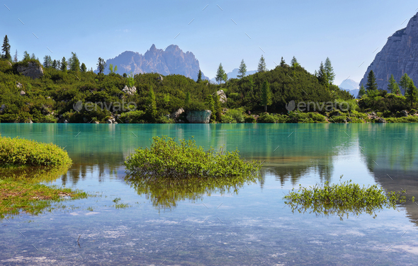 Turquoise Sorapis Lake with Dolomite Mountains, Italy, Europe - Stock Photo - Images