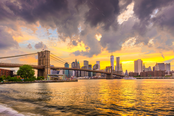 Lower Manhattan Skyline and Brooklyn Bridge - Stock Photo - Images