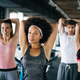 Group of sportive people in a gym. Concepts about lifestyle and sport in a  fitness club Stock Photo by nd3000