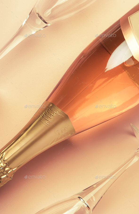 Bottle with pink sparkling wine or rose champagne - Stock Photo - Images