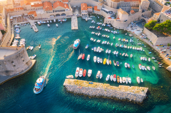 Aerial view of boats and yachts in port in old city at sunset - Stock Photo - Images