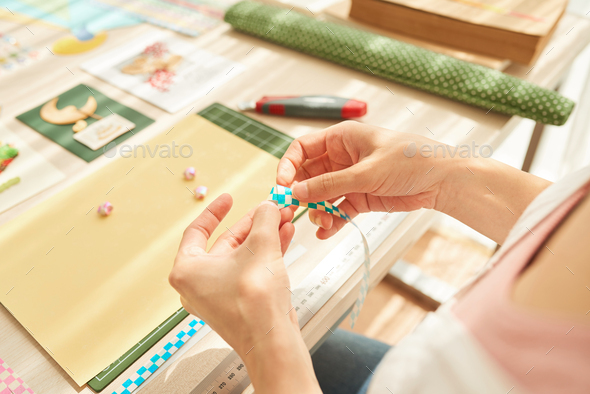 Woman Wrapped up in Scrapbooking - Stock Photo - Images