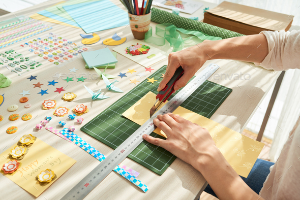 Creative Woman Concentrated on Scrapbooking - Stock Photo - Images