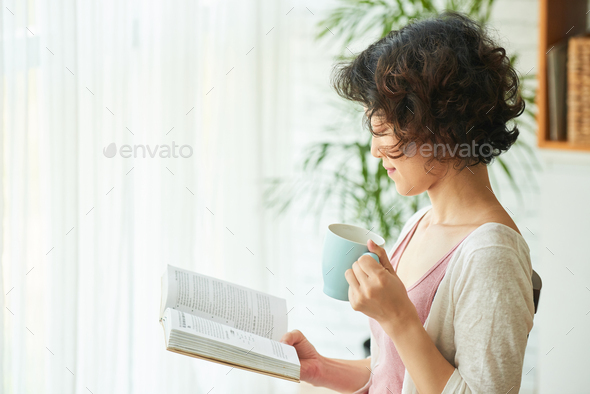 Curly Woman Enjoying Weekend at Home - Stock Photo - Images
