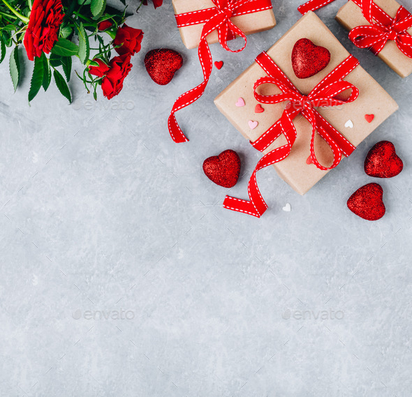 Valentine Day background with red hearts, gift boxes with red ribbons and red roses. - Stock Photo - Images