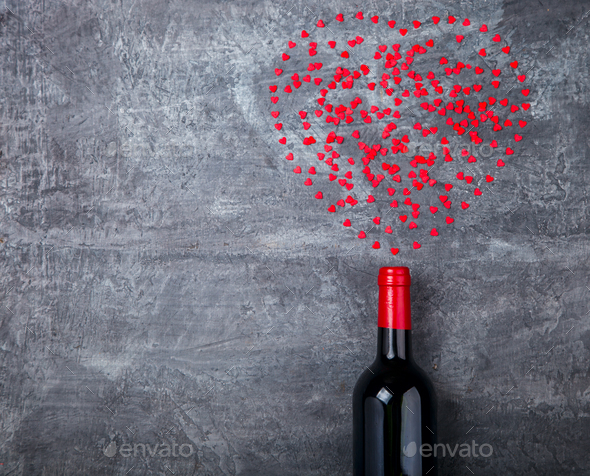 Small hearts ,shoots out of the bottle. Symbol of Love.Holiday Valentin Day.