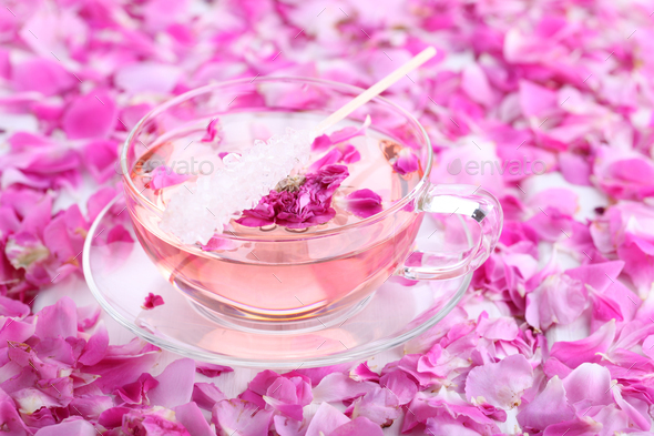 Tea with rose petals in a glass Cup. Rose water.Concept Holiday Valentine Day.