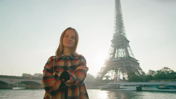 Hero Shot of Woman Portrait with Crossed Arms at Eiffel Tower in Paris France