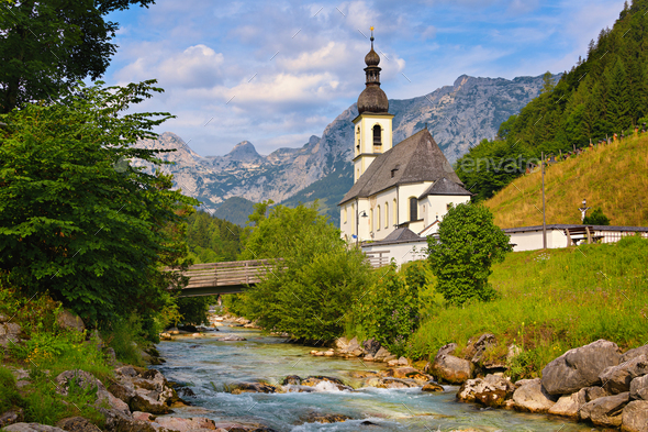 Alpine church with a mountain stream in Germany - Stock Photo - Images