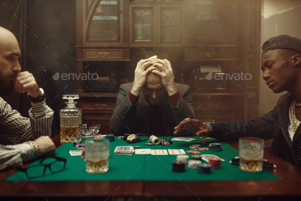 Poker player spend all money in casino, risk - Stock Photo - Images