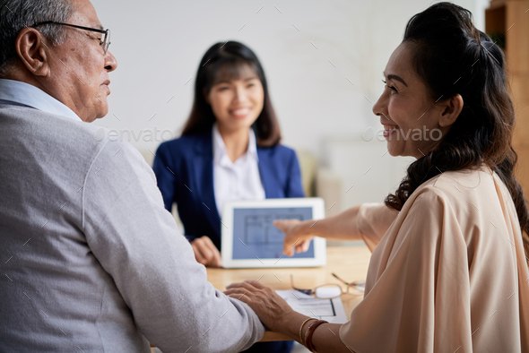 Making Choice at Office of Estate Agent - Stock Photo - Images