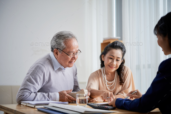 Senior Couple Buying Real Estate - Stock Photo - Images