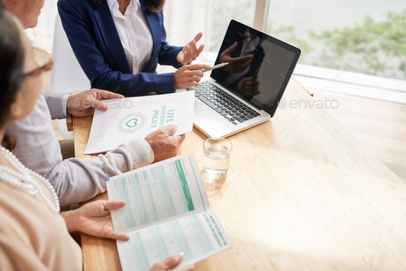 Studying Life Insurance Policy - Stock Photo - Images