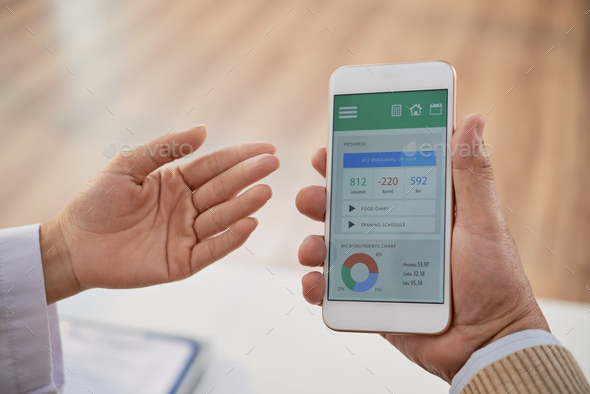 Teaching Patient to Use Health Monitoring App - Stock Photo - Images