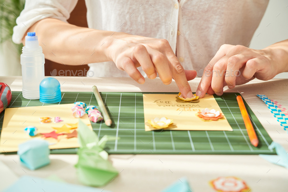 Decorating Greeting Card with Paper Flowers - Stock Photo - Images