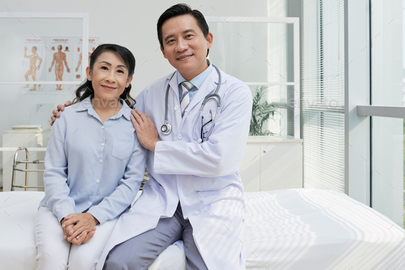 Portrait of Friendly Physician and His Patient - Stock Photo - Images