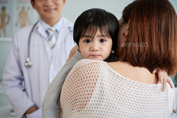 Discussing Treatment with Pediatrician - Stock Photo - Images