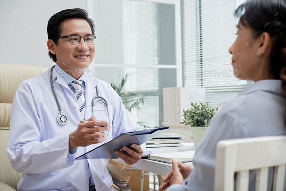 Giving Recommendations to Patient - Stock Photo - Images