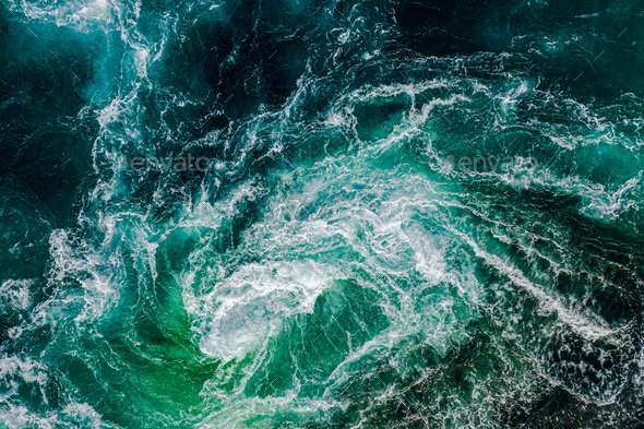 Waves of water of the river and the sea meet each other during high tide and low tide. - Stock Photo - Images