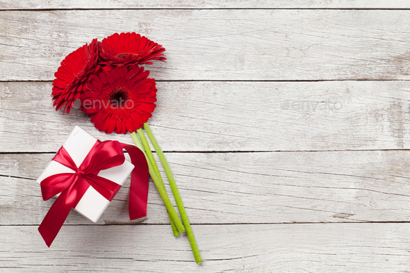 Valentines day gift box and gerbera bouquet - Stock Photo - Images