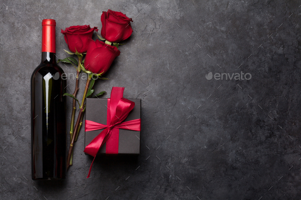 Valentines day with wine and roses bouquet - Stock Photo - Images