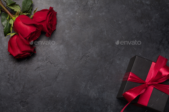 Valentines day gift box and roses bouquet - Stock Photo - Images