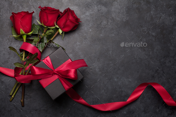 Valentines day gift box and roses bouquet - Stock Photo - Images