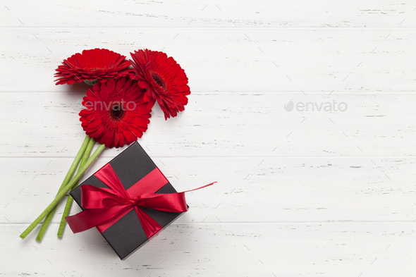 Valentines day gift box and gerbera bouquet - Stock Photo - Images
