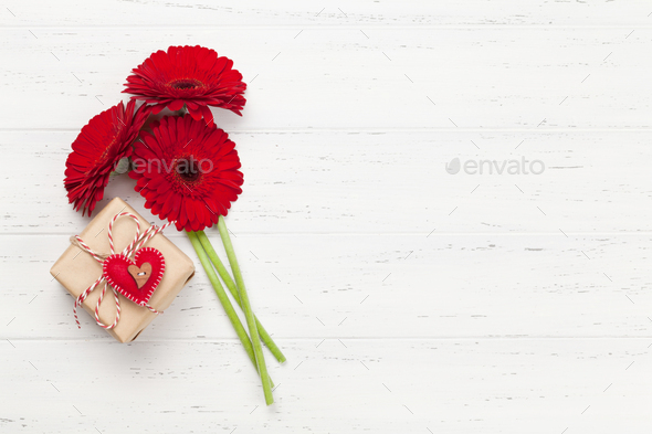 Valentines day gift box and gerbera bouquet - Stock Photo - Images