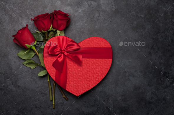 Valentines day gift box and roses bouquet - Stock Photo - Images