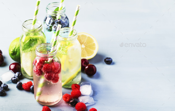 Berry, fruit and citrus non-alcoholic refreshing ice cold beverages - Stock Photo - Images