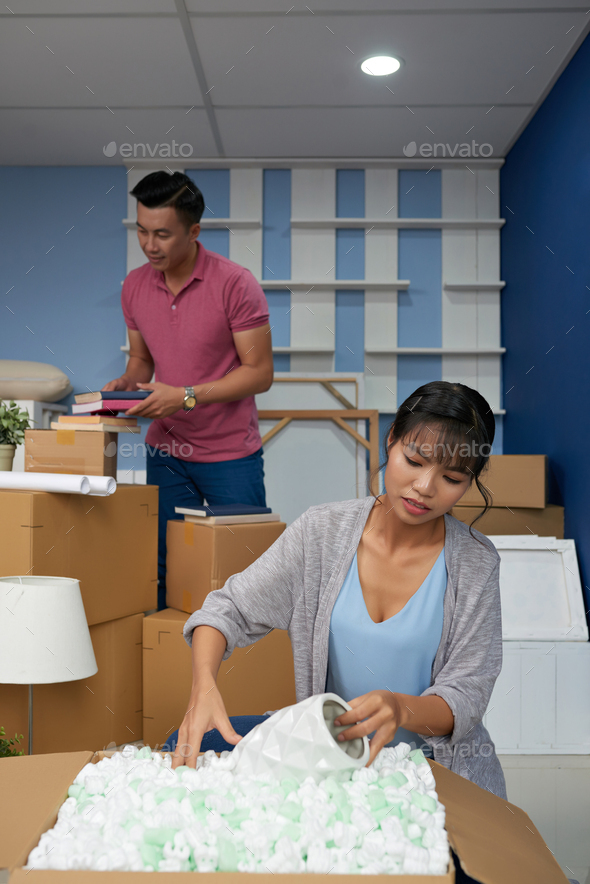 Couple Moving In New Apartment - Stock Photo - Images