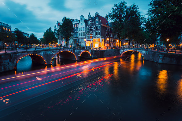 Amazing Light trails and reflections on water at the Leidsegracht and Keizersgracht canals in - Stock Photo - Images