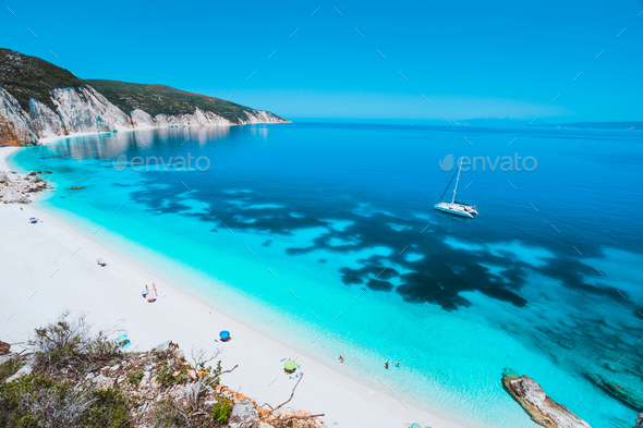 Lonely white catamaran yacht drift in clear blue Caribbean like sea water. Tourists leisure activity - Stock Photo - Images