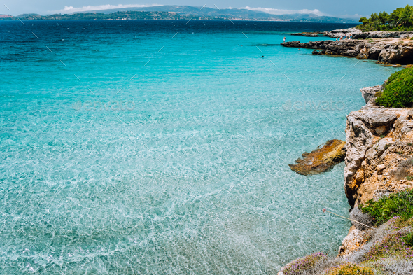 Cristal clear turquoise sea water. Seaside beach lagoon and scenery coastline of Kefalonia island - Stock Photo - Images