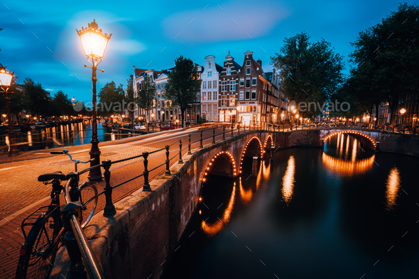 Night cityview of Famous Keizersgracht Emperor's canal in Amsterdam, tranquil scene with street - Stock Photo - Images