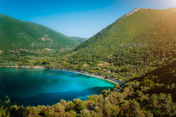 Antisamos beach on Kefalonia island, Greece. Crystal clear water, huge hills overgrown with - Stock Photo - Images
