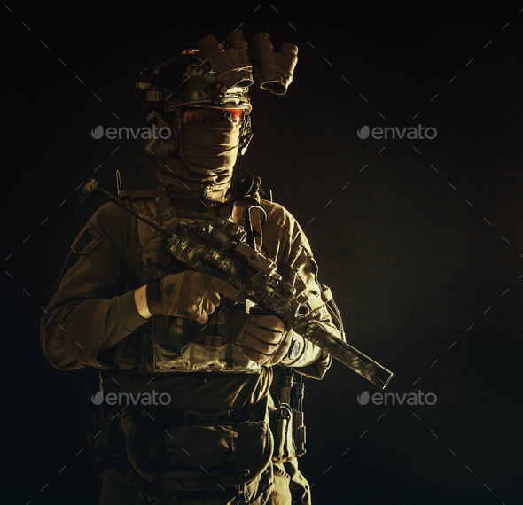 Portrait of elite commando fighter in darkness - Stock Photo - Images