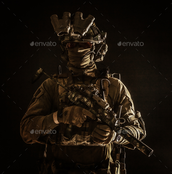 Portrait of elite commando fighter in darkness - Stock Photo - Images