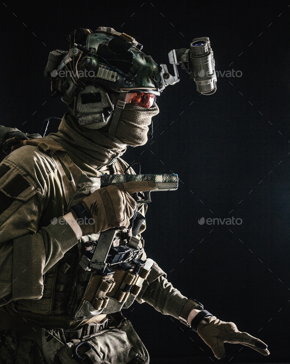 Military security service fighter sneaking in dark - Stock Photo - Images