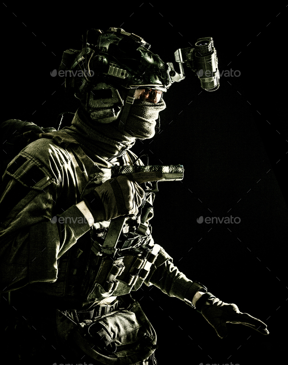 Military security service fighter sneaking in dark - Stock Photo - Images