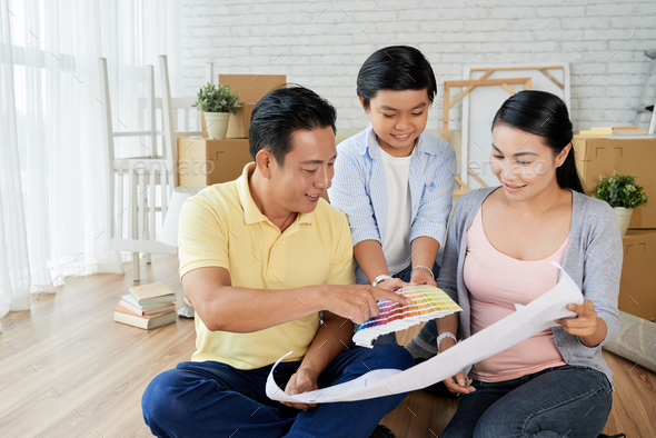 Choosing Paint Color for New Apartment - Stock Photo - Images