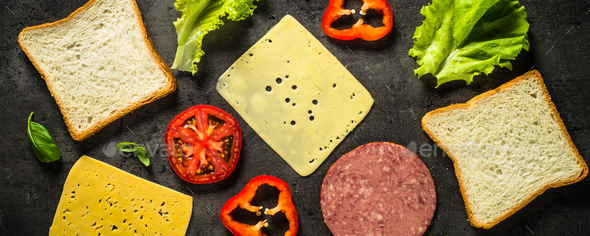Ingredients for sandwich on a black background - Stock Photo - Images