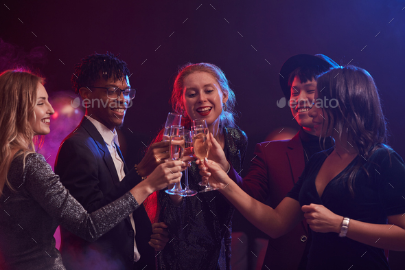 Young People Celebrating in Nightclub - Stock Photo - Images